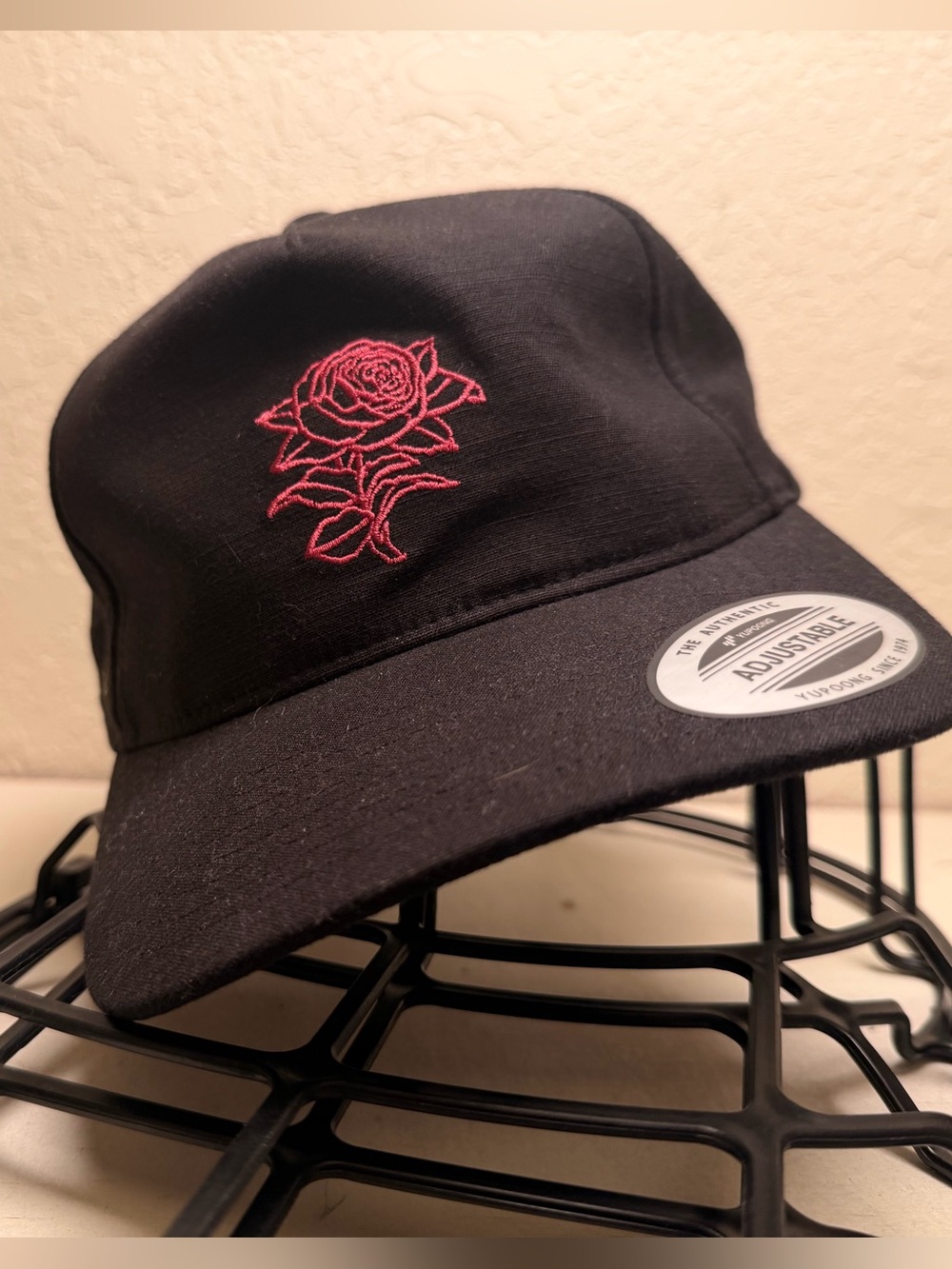 Travis Mathew Black Hat with Pink Rose Embroidery